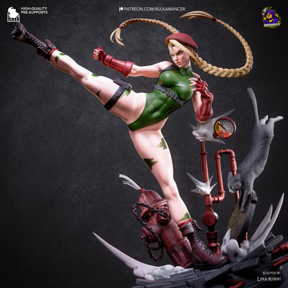 Cammy from Street Fighter collectible figurine featuring her iconic braided blonde hair, combat outfit, muscular athletic physique and dynamic fighting pose with detailed character design. Front view
