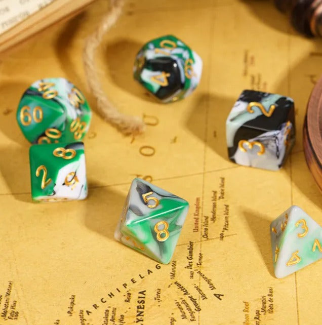Set of green and black dice on a map background