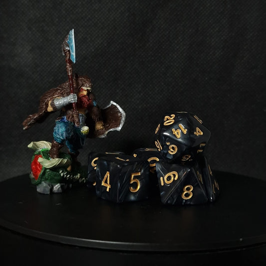 D&D dices black and gold