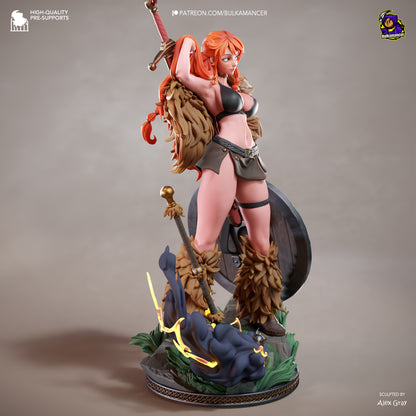 Statue of a warrior woman with red hair, armor, and weapons on a gray background